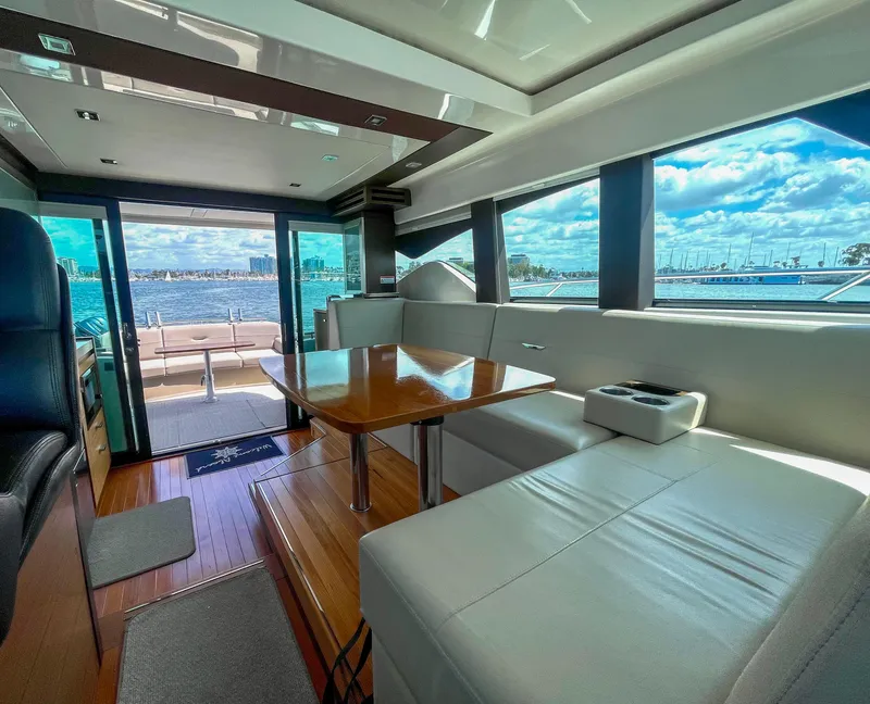 Slide: The Image of Luxurious interior of 2017 Tiara Yachts 44 Coupe with waterfront view. - 24