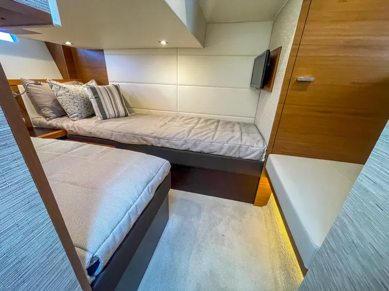 Slide: The Image of Luxurious interior of 2017 Tiara Yachts 44 Coupe with cozy bedding and modern design. - 36