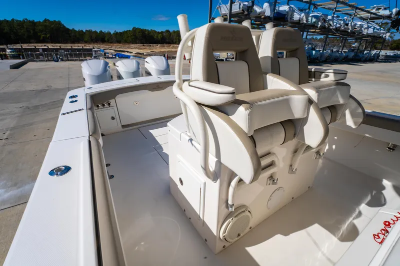 Slide: The Image of 2019 Regulator 34 boat with dual helm seats and spacious deck. - 13