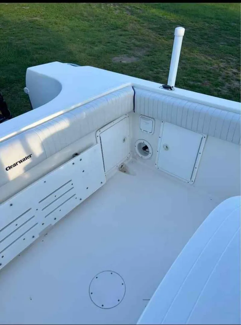 Slide: The Image of 2008 Clearwater 2500 boat interior with seating and storage compartments. - 10