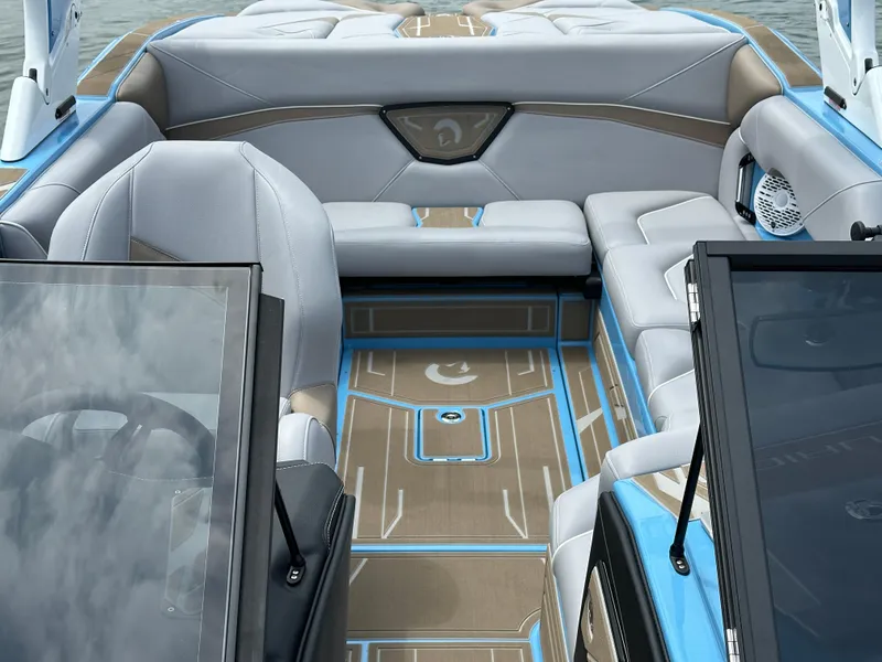 Slide: The Image of Interior of 2025 Centurion NV233 boat with modern seating and sleek design. - 12