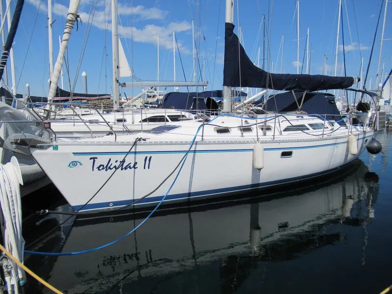 The Image of Sailboat Catalina 400, 1995 model, docked in marina with clear blue sky. - 0