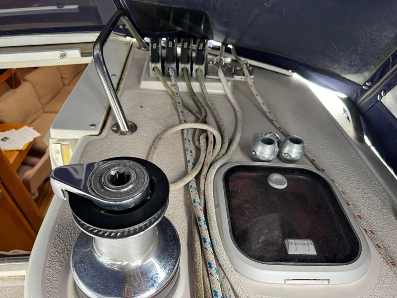 Slide: The Image of Deck of 1995 Catalina 400 sailboat with winch, ropes, and hatch. - 32