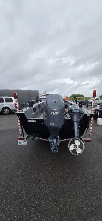 Slide: The Image of 2019 Alumaweld 20 Adventure boat with outboard motor, parked on a trailer. - 5