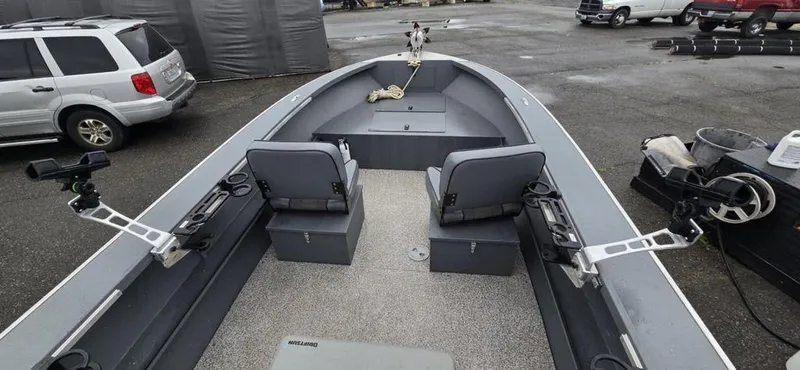 Slide: The Image of 2019 Alumaweld 20 Adventure boat interior with seating and fishing rod holders. - 6