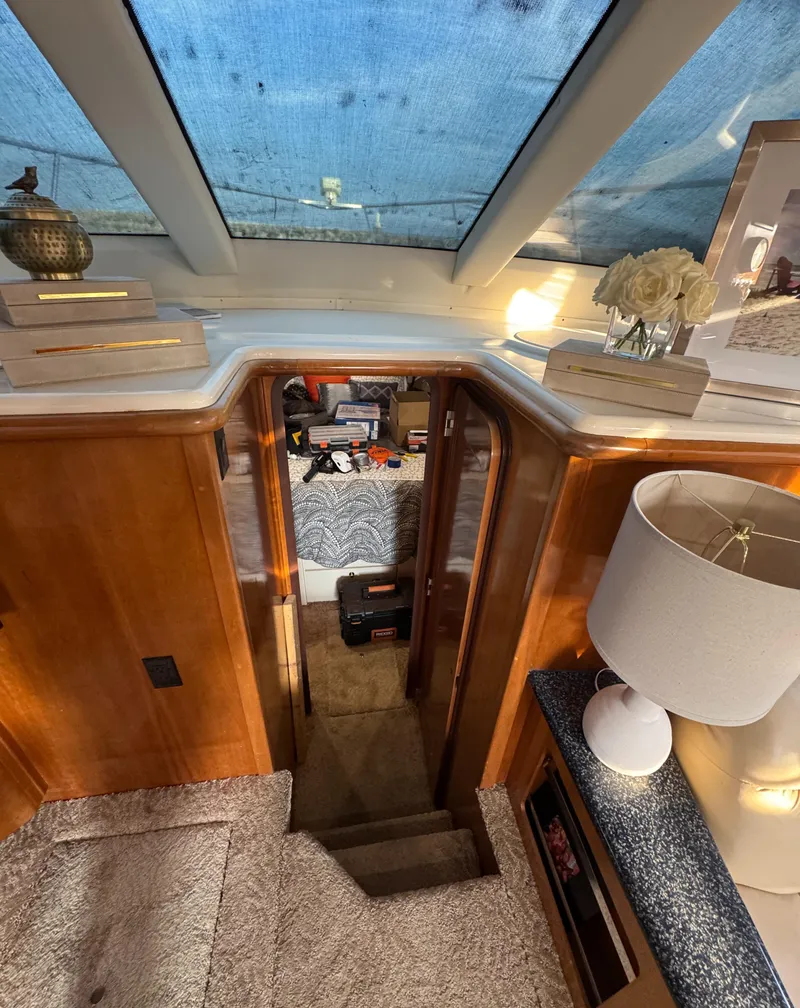 Slide: The Image of Interior of 2000 Carver 504 Cockpit Motor Yacht with elegant decor and skylight. - 32