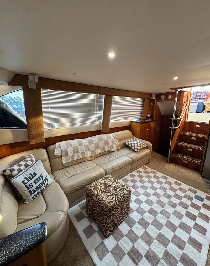 Slide: The Image of Interior of 2000 Carver 504 Cockpit Motor Yacht with cozy seating and stylish decor. - 38