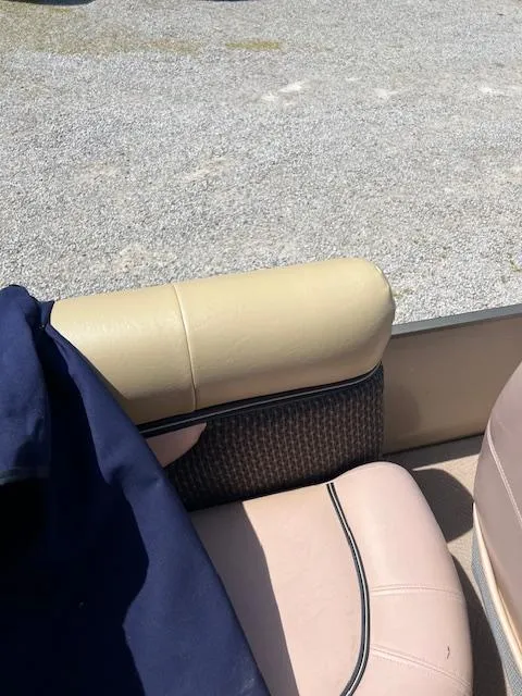 Slide: The Image of 2008 Godfrey SANPAN 2500 DC boat interior with beige and pink seating. - 11