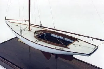 Slide: The Image of Model of 1995 Herreshoff Watch Hill 15 sailboat on display stand. - 8