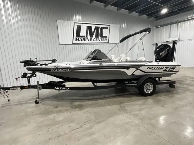 Slide: The Image of Top view of a 2019 Nitro Z19 Sport boat with seating and motor. - 1