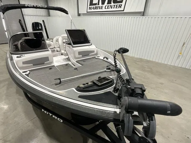 Slide: The Image of 2019 Nitro Z19 Sport boat in showroom, featuring sleek design and advanced equipment. - 8