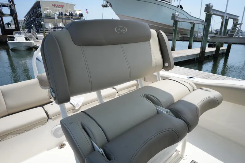 Slide: The Image of 2023 Key West 219 FS boat seating at marina dock. - 20
