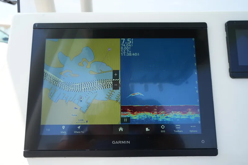 Slide: The Image of Garmin navigation display on 2023 Key West 219 FS boat, showing map and sonar data. - 26