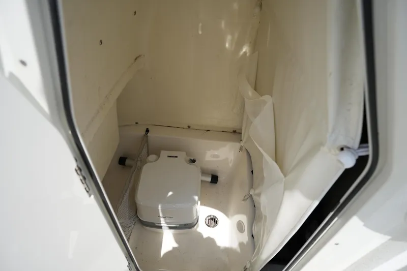 Slide: The Image of 2023 Key West 219 FS boat interior storage compartment. - 30
