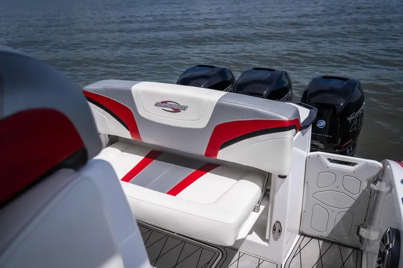 Slide: The Image of 2017 Sunsation 34 CCX boat with stylish seating and powerful outboard motors on the water. - 18