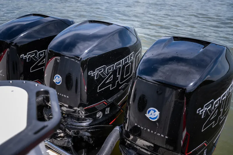 Slide: The Image of Triple Mercury Racing 400 outboard engines on a 2017 Sunsation 34 CCX boat. - 21