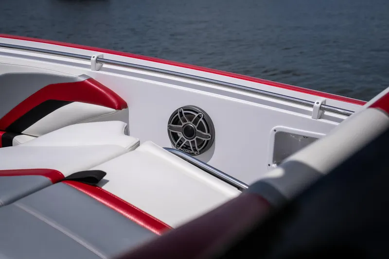 Slide: The Image of 2017 Sunsation 34 CCX boat interior with red and white seating, speaker detail. - 23
