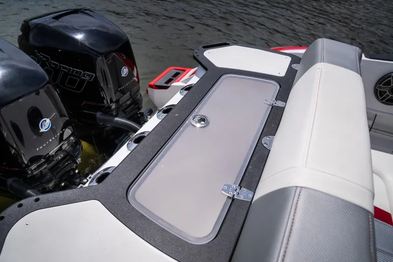Slide: The Image of 2017 Sunsation 34 CCX boat with dual Mercury outboard engines, featuring a sleek rear seating area. - 34