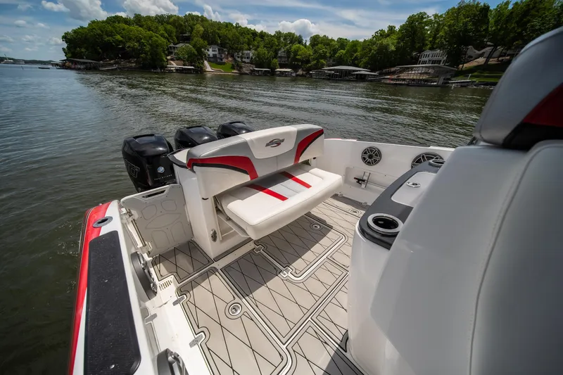 Slide: The Image of 2017 Sunsation 34 CCX boat with seating, on a scenic lake. - 46