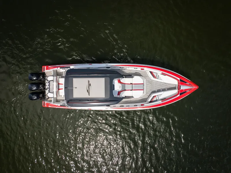 Slide: The Image of Overhead view of 2017 Sunsation 34 CCX boat on water. - 9