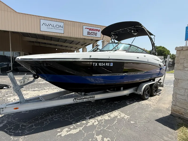 Slide: The Image of 2019 Monterey MX6 SURF boat on trailer outside dealership. - 33