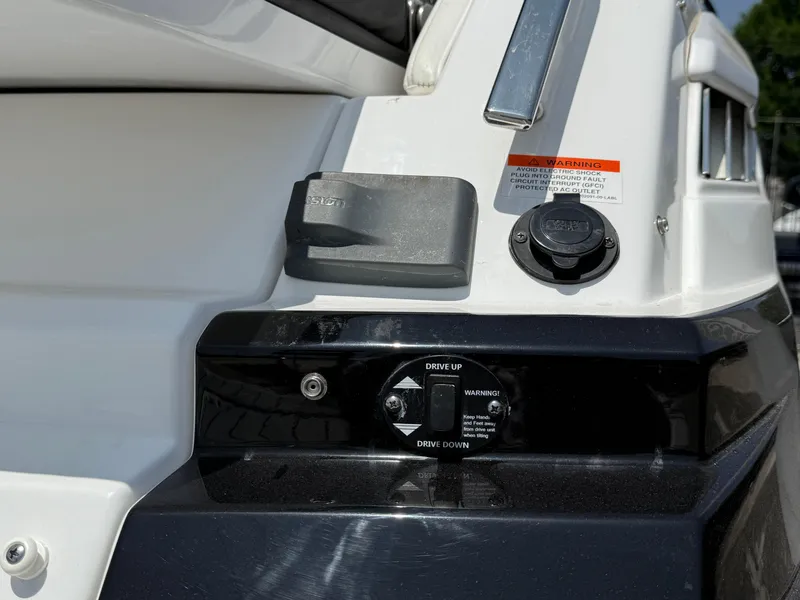 Slide: The Image of 2019 Monterey MX6 SURF boat control panel with drive adjustment features. - 38