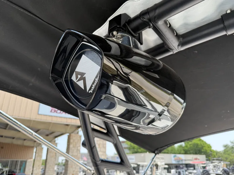 Slide: The Image of 2019 Monterey MX6 SURF boat with Rockford Fosgate speaker mounted on the canopy. - 44