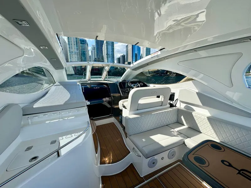 Slide: The Image of Luxurious interior of 2023 Schaefer 375 yacht with modern design and city skyline view. - 25