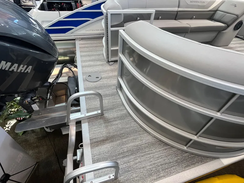 Slide: The Image of 2025 Bennington 22SXSRC pontoon boat with Yamaha motor, featuring spacious seating and modern design. - 5