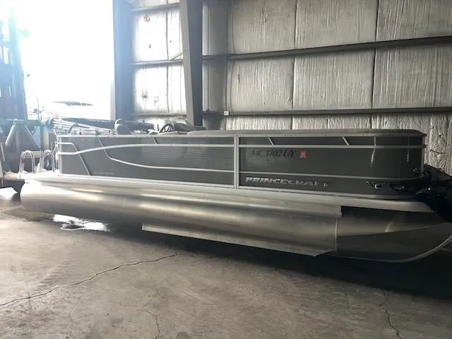 The Image of 2023 Princecraft Vectra 23 LT pontoon boat in a storage facility. - 1