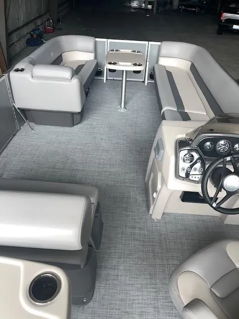 Slide: The Image of 2023 Princecraft Vectra 23 LT pontoon boat interior with seating and steering console. - 11