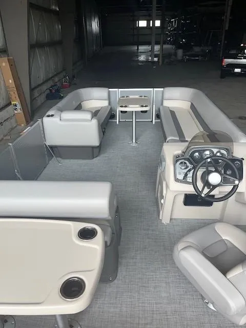 Slide: The Image of 2023 Princecraft Vectra 23 LT pontoon boat interior with seating and steering console. - 12