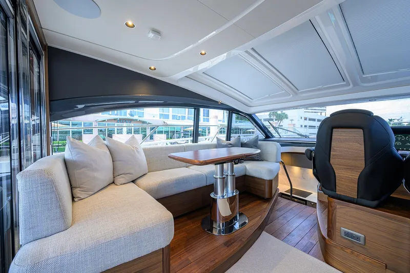Slide: The Image of Luxurious interior of 2026 Princess V50 Deck Salon yacht with elegant seating and modern design. - 17