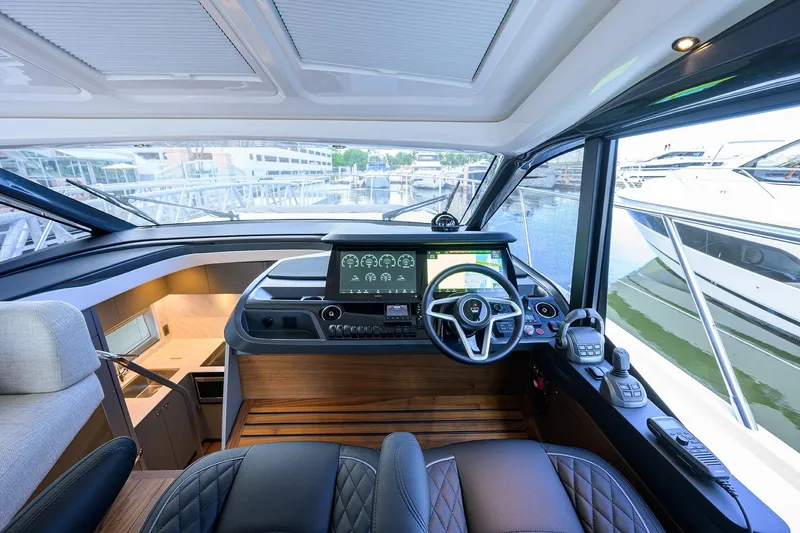 Slide: The Image of Modern helm of 2026 Princess V50 Deck Salon yacht with advanced navigation systems. - 20