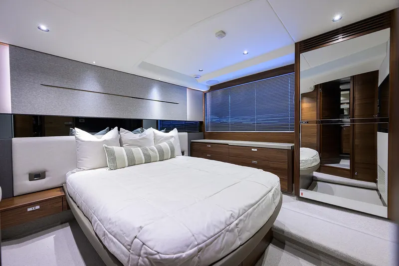 Slide: The Image of Luxurious bedroom interior of 2026 Princess V50 Deck Salon yacht, featuring modern design and elegant furnishings. - 36