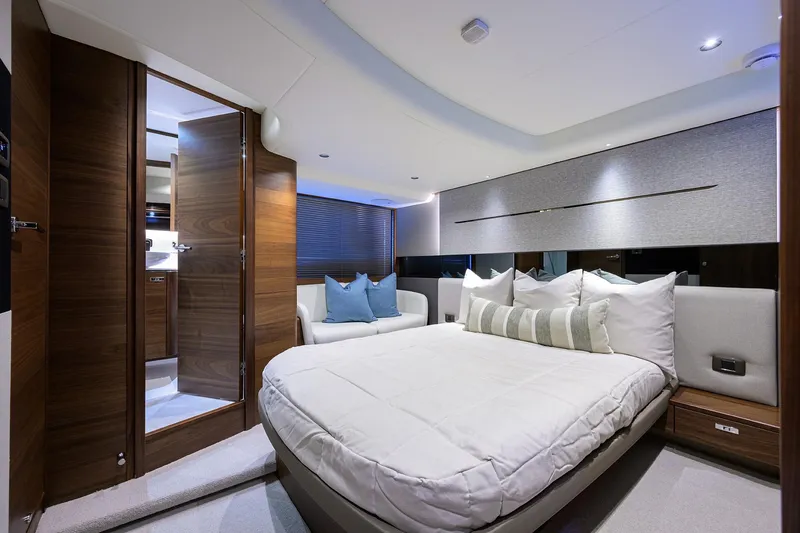 Slide: The Image of Luxurious interior of 2026 Princess V50 Deck Salon yacht bedroom with modern design. - 37