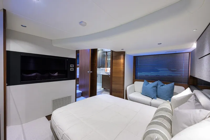 Slide: The Image of Luxurious interior of 2026 Princess V50 Deck Salon yacht with modern furnishings and elegant design. - 38