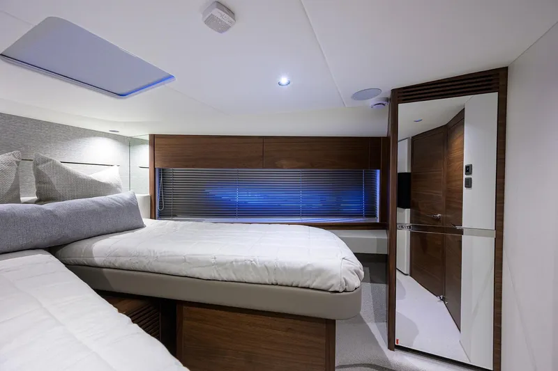 Slide: The Image of Luxurious interior of 2026 Princess V50 Deck Salon yacht bedroom with modern design. - 49
