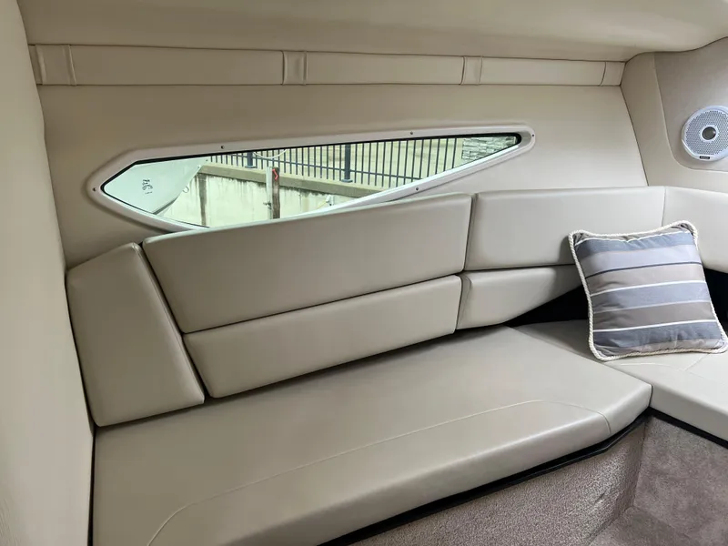 Slide: The Image of Tachometer and trim gauge on 2018 Regal Commodore 258 boat dashboard. - 15