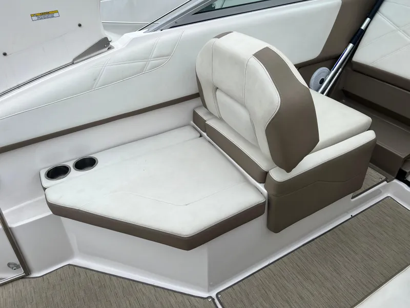 Slide: The Image of Rear view of 2018 Regal Commodore 258 boat on a trailer, showing the propeller and stern. - 9