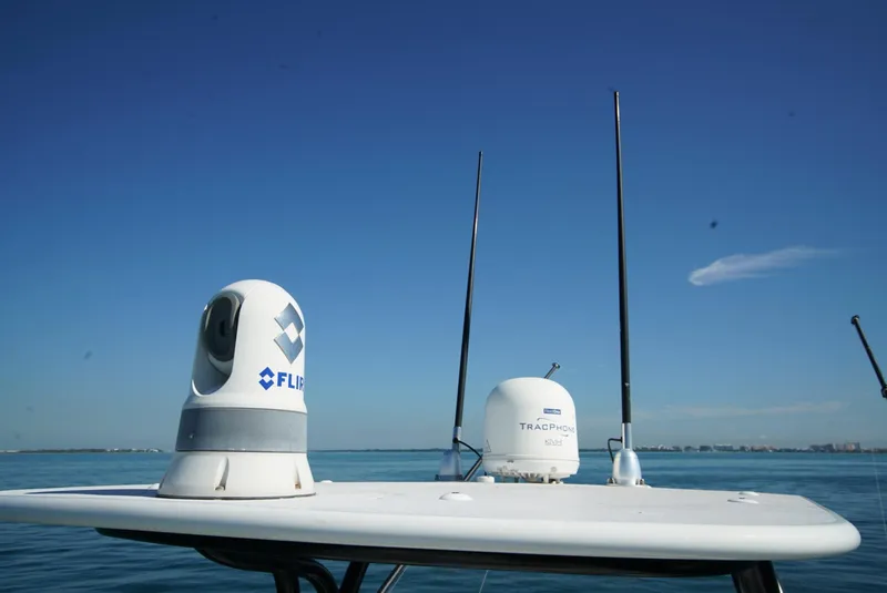 Slide: The Image of 2018 SeaVee 390Z boat with FLIR and radar equipment on calm ocean. - 11