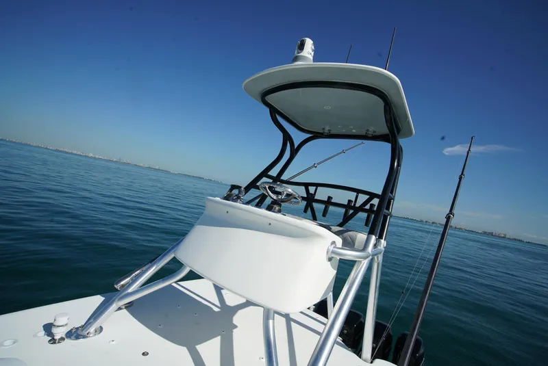 Slide: The Image of 2018 SeaVee 390Z boat on calm ocean waters under clear blue sky. - 16