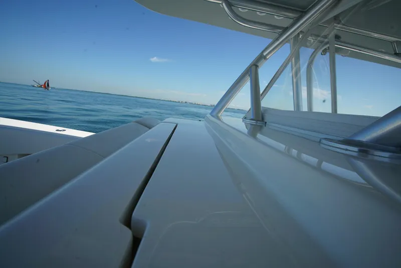 Slide: The Image of 2018 SeaVee 390Z boat on calm ocean with clear blue sky. - 33
