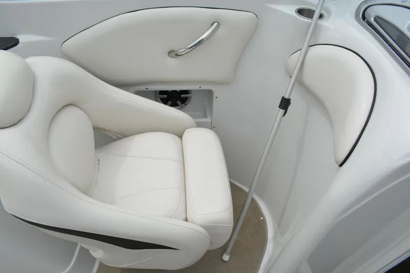 Slide: The Image of 2007 Crownline 275 CCR boat interior with white seating and sleek design. - 15