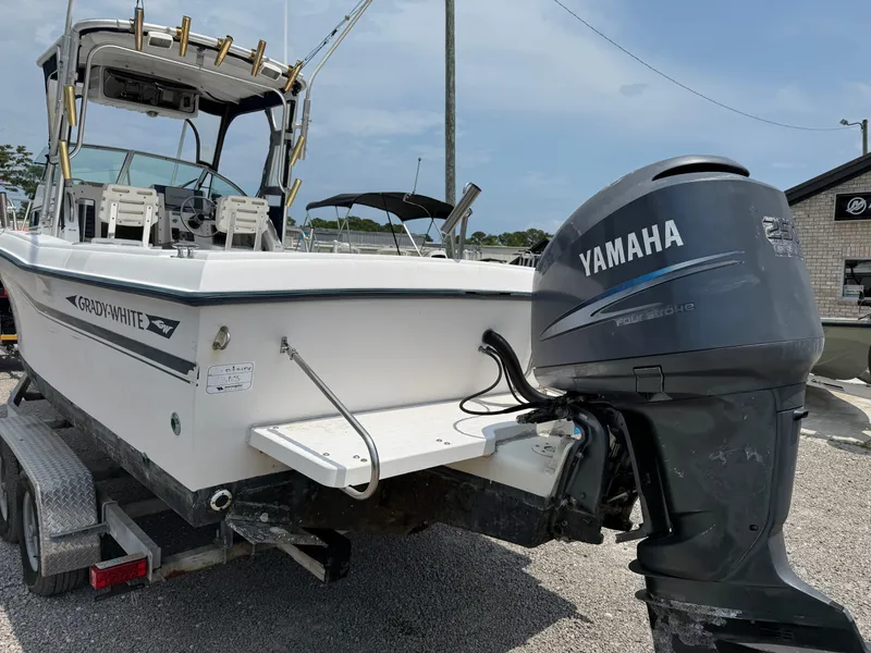 Slide: The Image of 1993 Grady-White Explorer 24 boat with Yamaha outboard motor on trailer. - 4