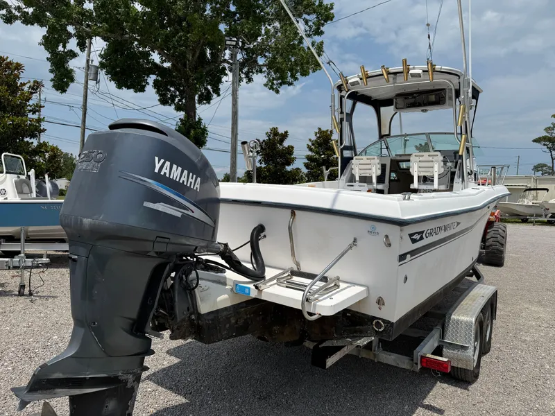 Slide: The Image of 1993 Grady-White Explorer 24 boat with Yamaha outboard motor on trailer. - 6