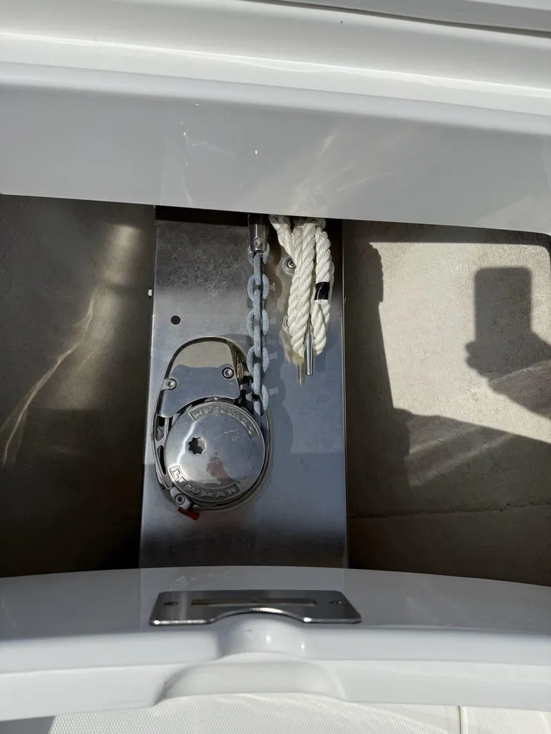Slide: The Image of Anchor compartment of 2021 Regulator 31 boat with chain and rope. - 12