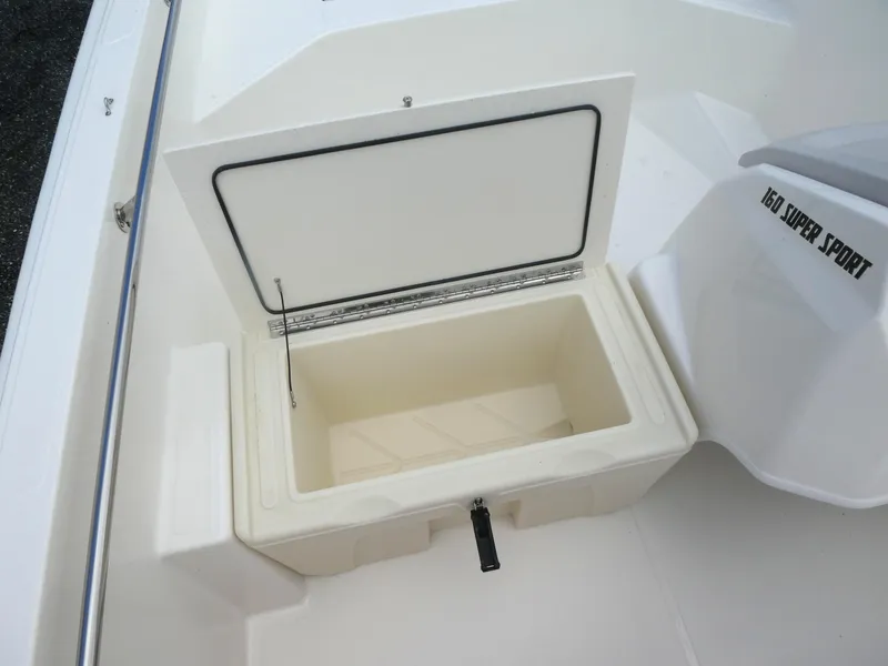 Slide: The Image of Open storage compartment on 2025 Boston Whaler 160 Super Sport boat. - 4