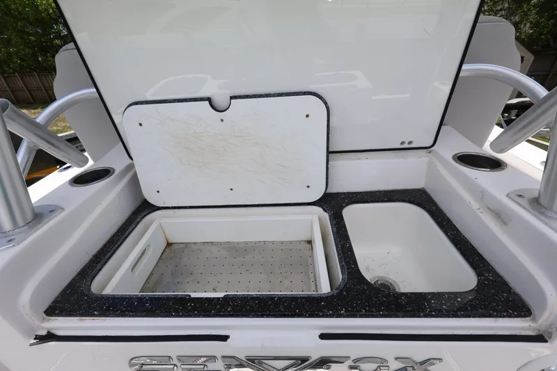Slide: The Image of Open storage compartment on 2020 Sea Fox 328 Commander boat. - 13