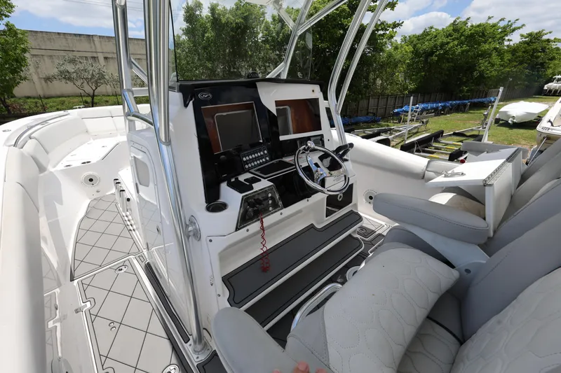 Slide: The Image of 2020 Sea Fox 328 Commander boat interior with modern helm and seating. - 14
